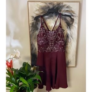 Perfect NYE Dress! Wine colored with beautiful silver design, corset style back
